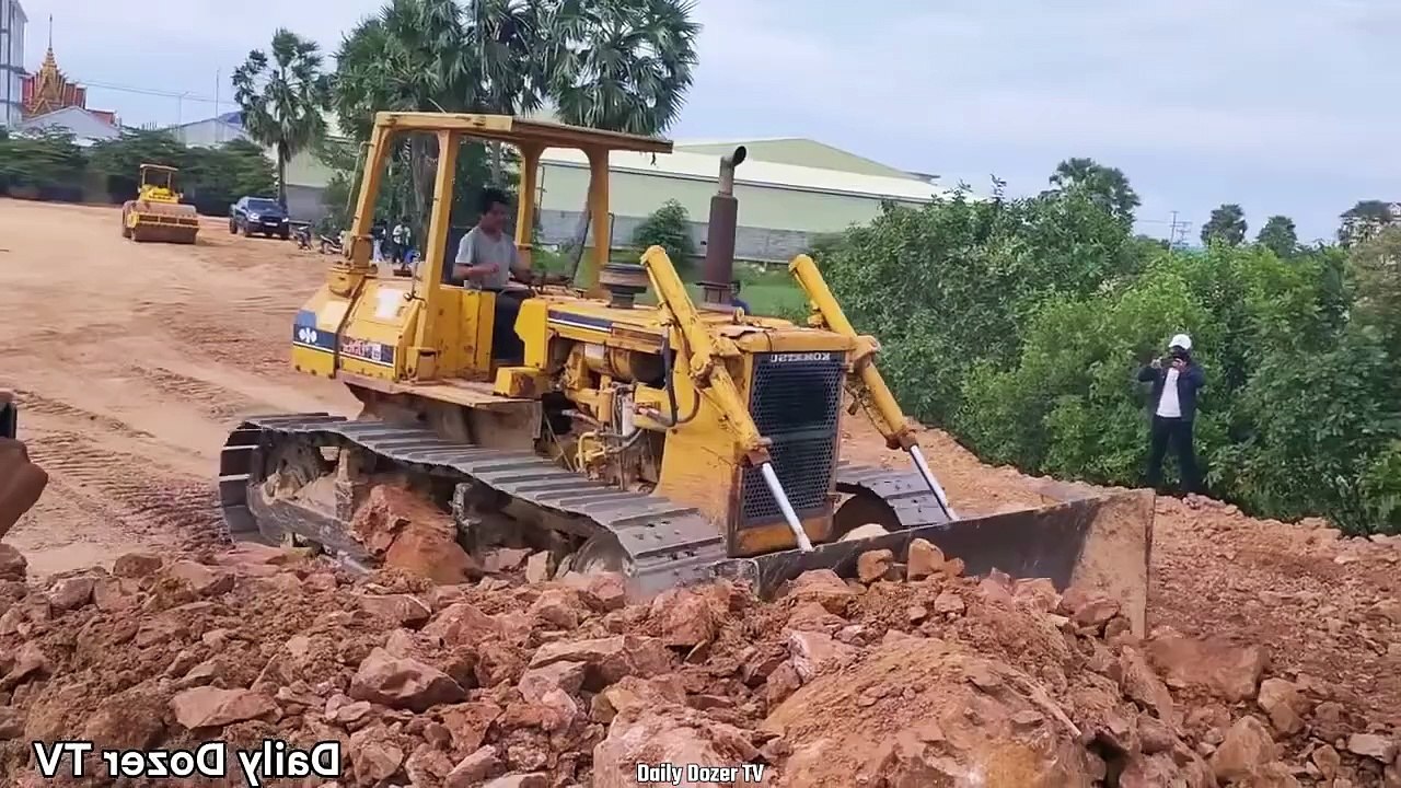 Very Amazing Many Dump truck 24T Unloading Soil Stone and Huge Dozer Soil Stone Pushing Filling Land
