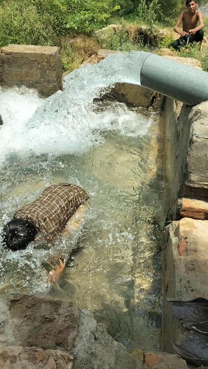We are irrigating our field using a solar-powered  irrigation system in Mianwali. The water is being applied to the land where we will soon plant (Pearl Millet.we also have vegetables including pumpkin (kaddu), ridge gourd (tori), and okra (bhindi).