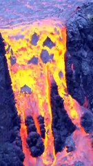 "Epic Lava Flow from Majestic Mountain | Nature's Fiery Power