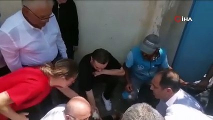 Sıcaktan bayılan gencin yardımına Başkan Büyükkılıç ve Sağlık Müdürü Erşan koştu