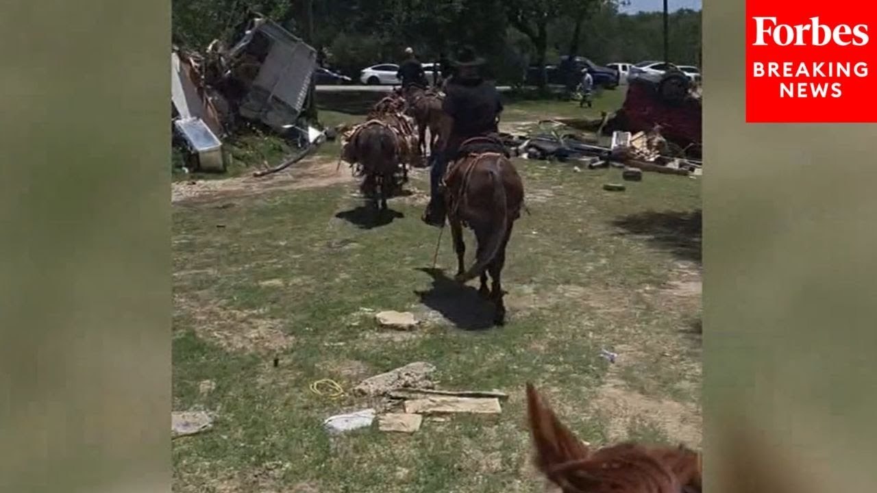 Relief Workers Ride On Muleback Through Texas Following Deadly Flooding