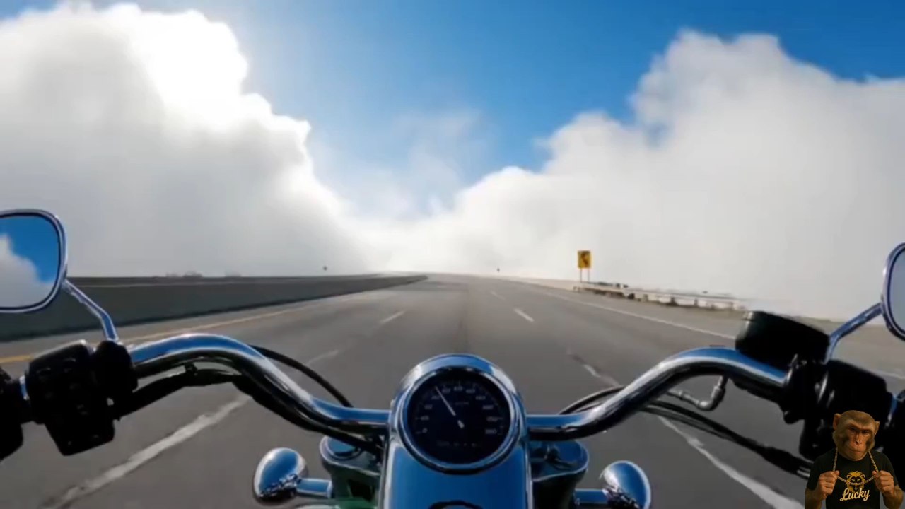 Riding Through the Clouds | Lucky's Cinematic AI Vlog AdventureJoin Lucky — your favorite AI monkey with swag — as he rides through dreamy mountain roads and surreal clouds in this cinematic short vlog.