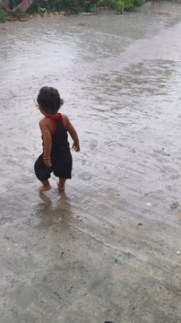 #village #raining #My grandson enjoying the rain