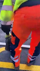 Road letters being painted in the UK