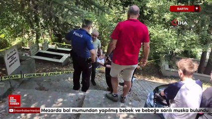 Bartın'da mezarda bal mumundan yapılmış bebek ve bebeğe sarılı muska bulundu