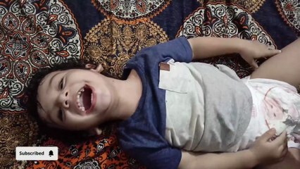 diaper leaked changing scene, baby started kicking his mother 😉😉😄