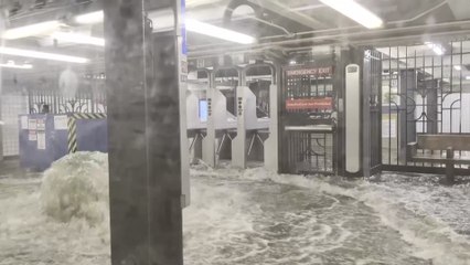 Floodwater gushes into New York city subway station amid heavy rainfall