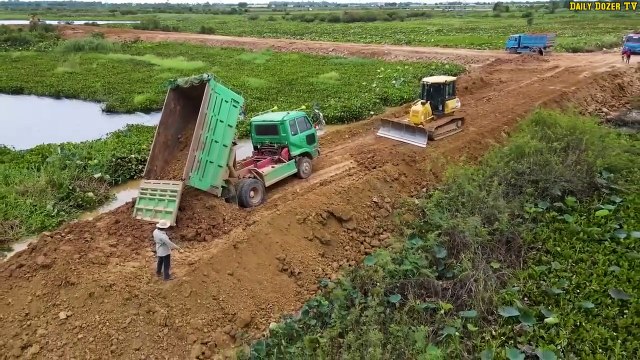 Best Amazing activity Many Dump Trucks 5 Ton unloading soil into water build new road