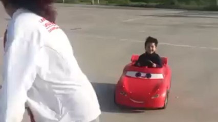 Toddler goes full speed in toy car and ends up hitting a pole