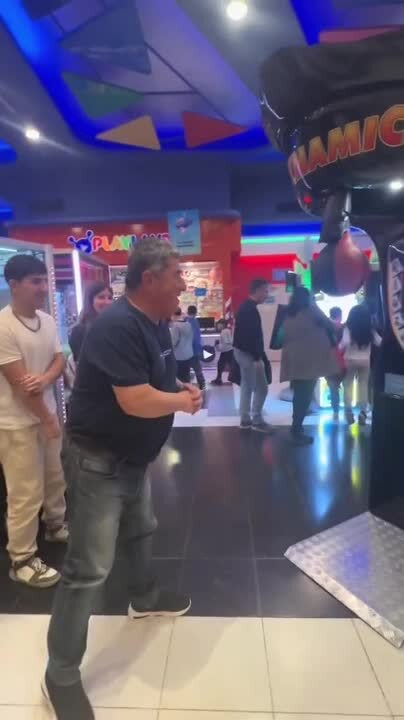 Man Misses and Falls at Punching Machine