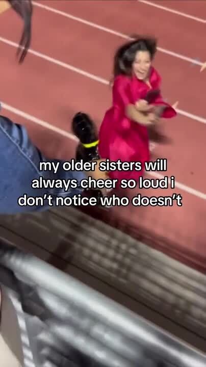 Proud Older Sisters Cheer Loudest at Younger Sister's High School Graduation
