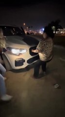 Aunt Accidentally Takes Out Car's Front Grill as She Hangs Onto it