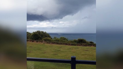 Watch the moment a tornado appears off the coast of Filey beach