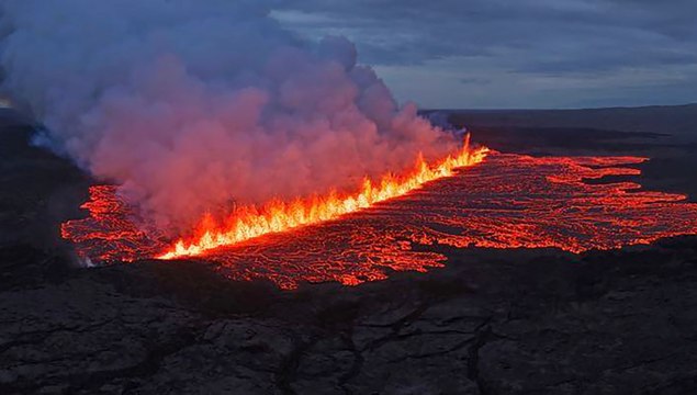 Lava flows during volcanic eruption in Iceland