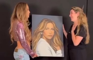 Jennifer Lopez encontra fã que pintou seu retrato em fila de show