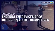 Bolsonaro encerra entrevista após interrupção de trompetista