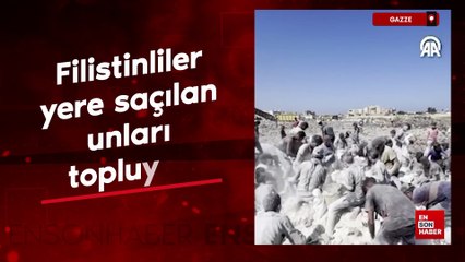 Gazze'de kıtlık Derinleşiyor: Filistinliler yere saçılan unları topluyor