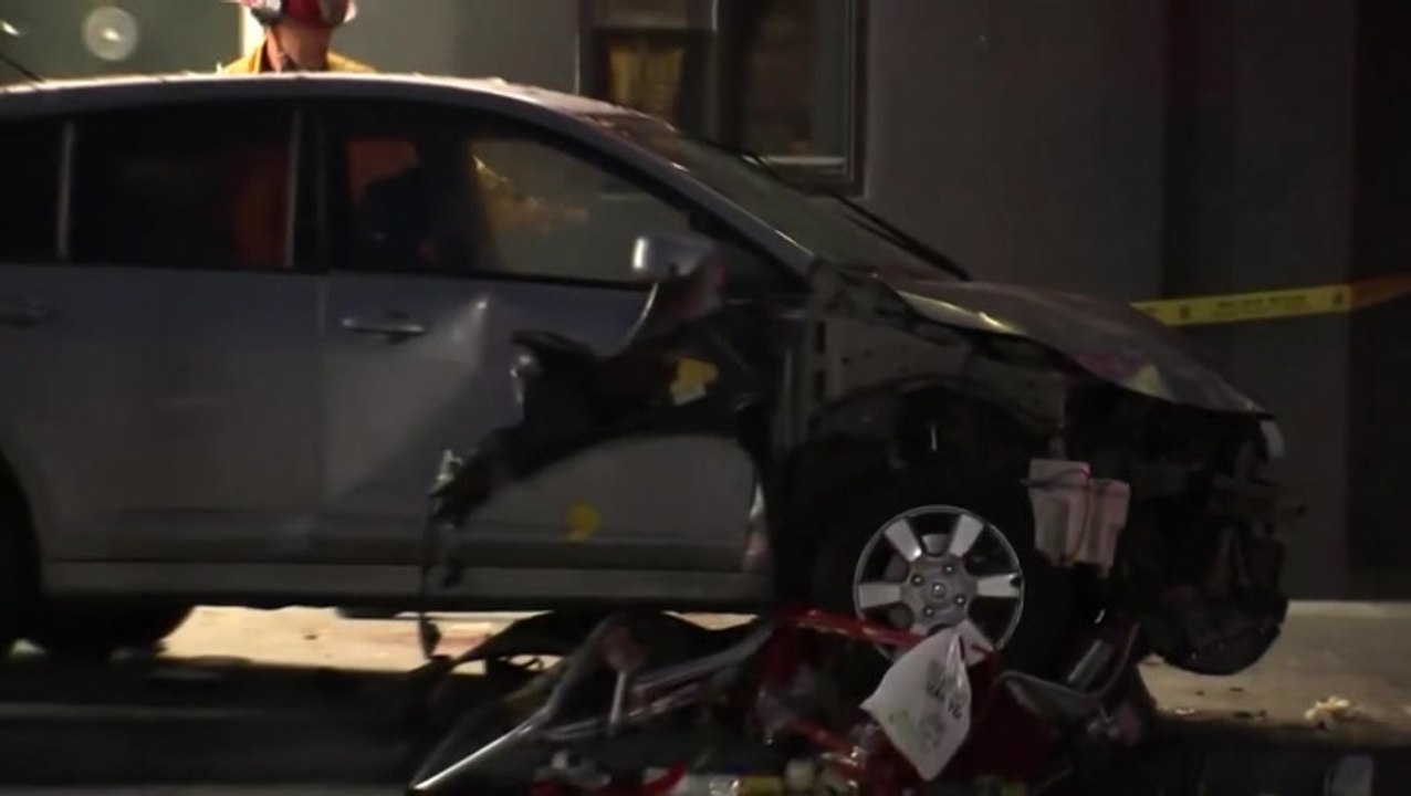 Emergency workers surround Los Angeles car collision site as at least 20 injured