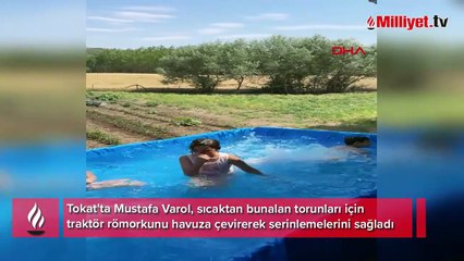 Sıcaklar bunalttı, traktörünü torunları için havuza çevirdi