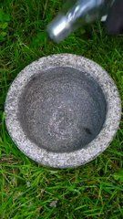 Crushing light bulbs back into sand!