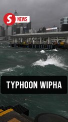 Hong Kong braves heavy rain and strong winds as typhoon Wipha approaches