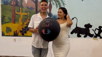 Suspense builds as gender reveal balloon needs a knife to spill the secret