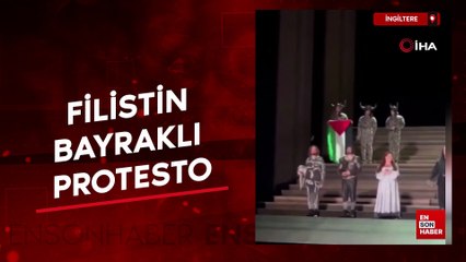 ngiltere’de Kraliyet Opera Salonu sahnesinde Filistin bayraklı protesto