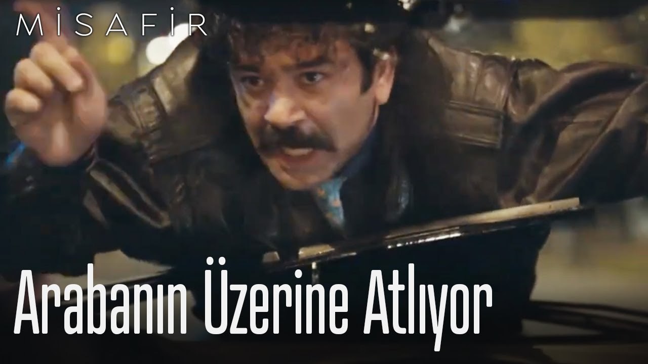 Arabanın üzerine atlıyor