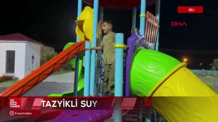 Iğdır’da çocuklar sulama aracından sıkılan suyla serinledi