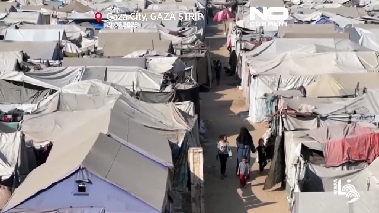 Displaced Gazans live in tents at bombed stadium in Gaza City