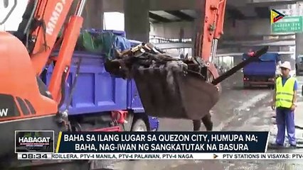 Baha sa ilang lugar sa Quezon city, humupa na; Baha, nag-iwan ng sangkatutak na basura