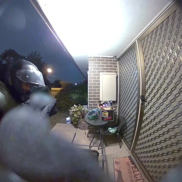 Pizza Delivery Driver Slips on Wet Porch and Falls to His Knees