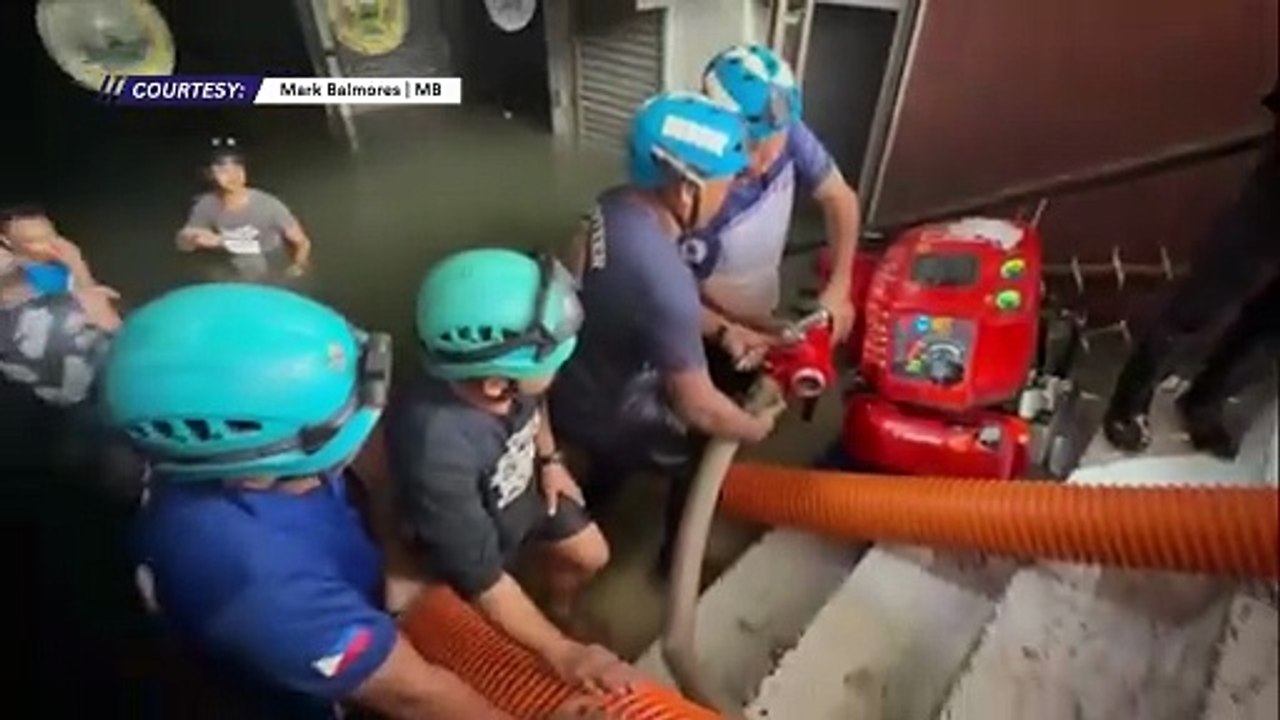MDRRMO use siphoning equipment to drain floodwaters in Manila