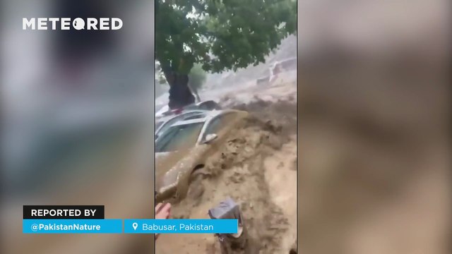 A flash flood leaves more than 10 dead in Babusar, Pakistan. A huge wave of water, mud, and rocks swept away buses and homes