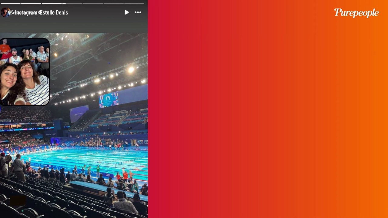 Estelle Denis et Raymond Domenech : Leur fils Merlin, parfait mélange de ses parents, pose avec sa mère... Le compagnon navigateur de l'animatrice est de la partie