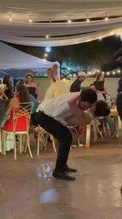 Couple Falls While Dancing During Celebration