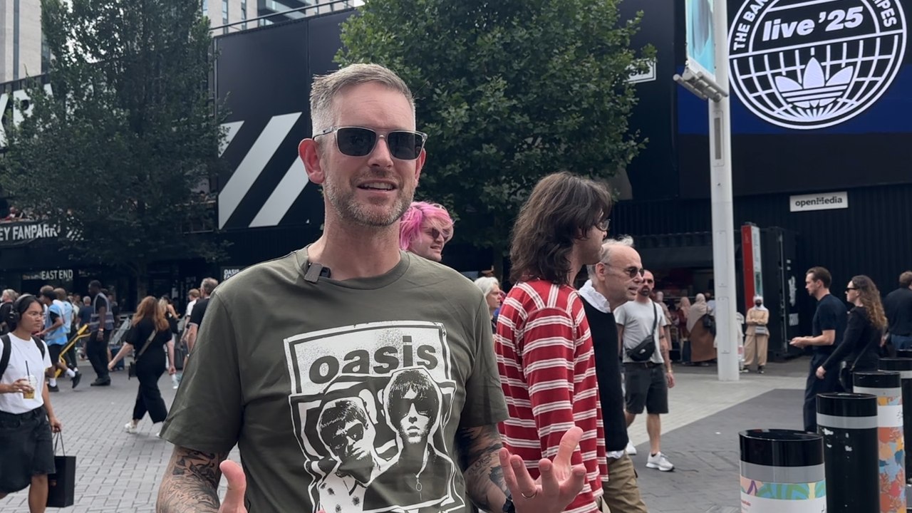 Oasis fans flock to Wembley Stadium in London