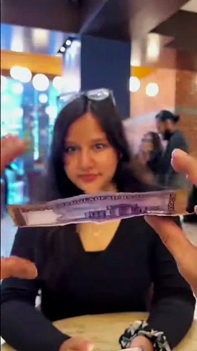 Girl confused with magic tricks
