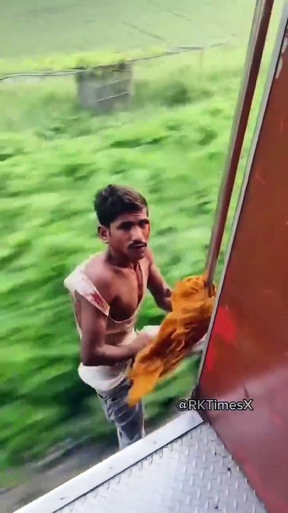 Thief JUMPS out of moving Train in desperation to save his life.  This person was caught stealing Mobile phones, the passengers beat him up and planned to throw him out of the train.   I get that he was stealing phones but was all this necessary, do peopl