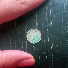 Spinning a Portuguese 2.50 escudo coin from 1983.