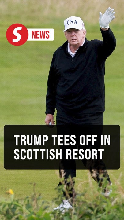 Trump waves to press while golfing on working holiday in his Scottish resort