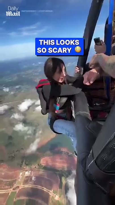 Woman_has_second_thoughts_going_sky_diving_for_the_first_time(360p)