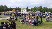 England fans in Telford Town Park celebrate England's goal against Spain