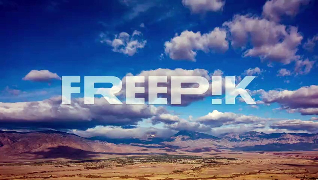 time lapse - beautiful cloudscape moving over mountain range and the valley