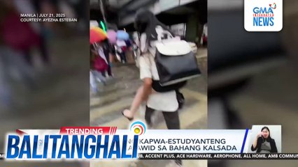 Babae, binuhat ng kapwa-estudyanteng lalaki para makatawid sa bahang kalsada | Balitanghali