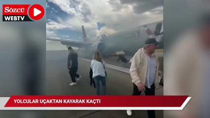 Yolcular uçaktan kayarak kaçtı