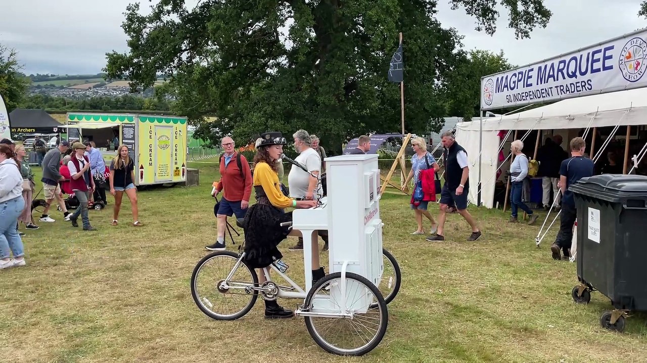 Chloe Marie Aston with her piano tricycle at the Mid Devon Show (Will Goddard, Crediton Courier)