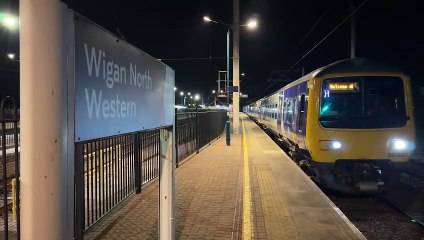 First electric trains run between Wigan and Bolton