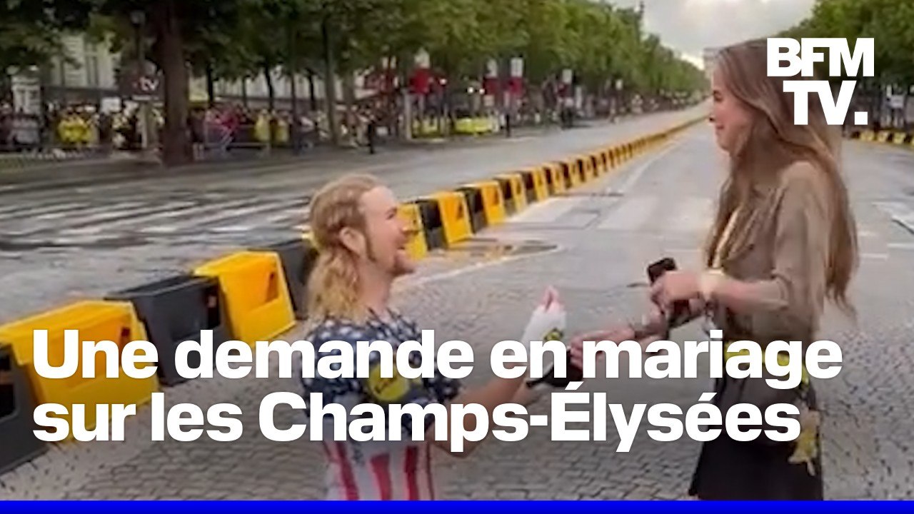 Un coureur du Tour de France demande en mariage sa compagne sur les Champs-Élysées