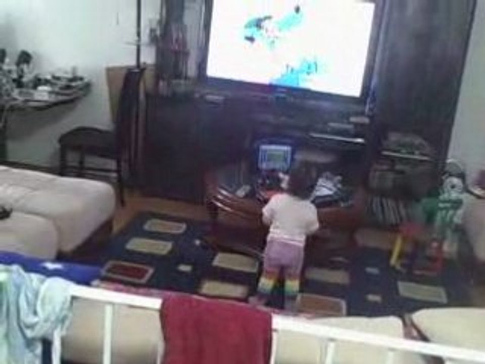 Diyora watching TV
